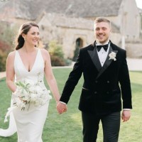 Couple at barn wedding venue in Oxfordshire