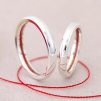 The red thread of destiny is an Asian myth, which speaks of the connection between two people that are destined to be together. During the ceremony a couples hands are linked together using a red thread. Red thread of destiny wedding rings