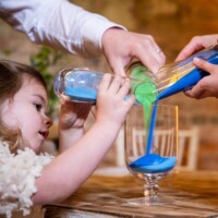 A sand ceremony is a lovely way to include family and friends and signifies unity and togetherness A sand ceremony at a baby naming