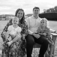 Family at outdoor naming ceremony in Oxfordshire